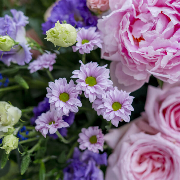 variety of flowers beautifully arranged in a large box