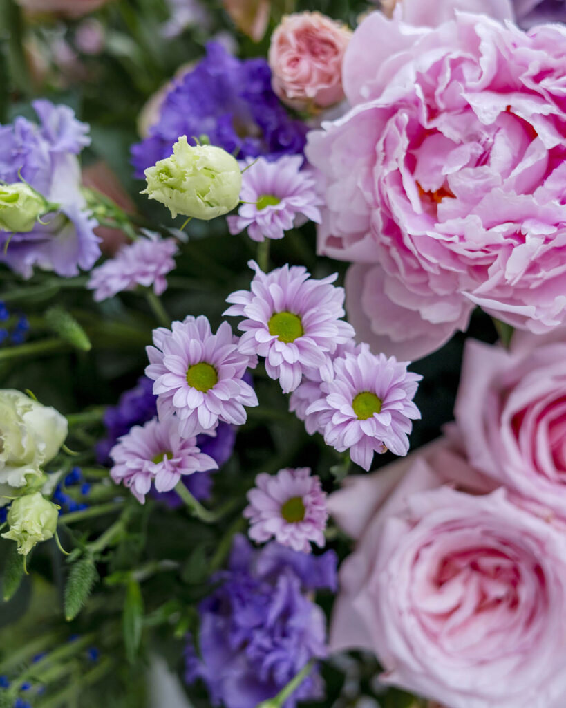 variety of flowers beautifully arranged in a large box
