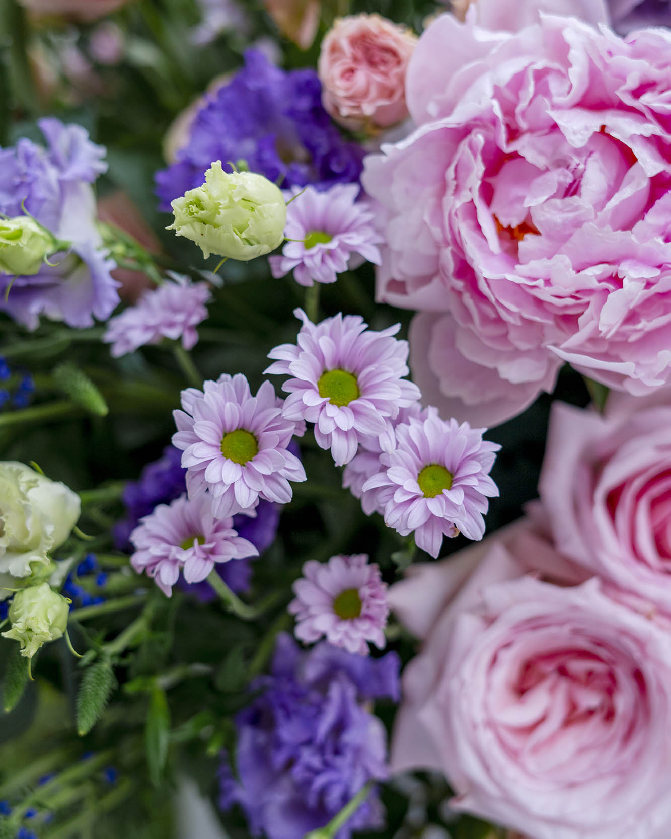 variety of flowers beautifully arranged in a large box
