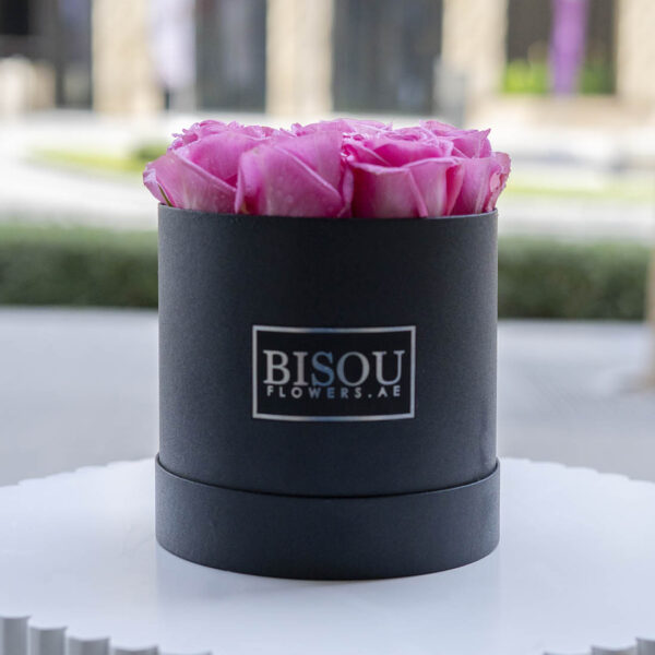 pink roses in BISOU drum shaped box