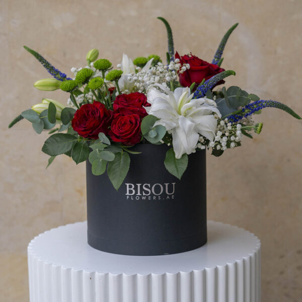 bella flower bouquet arrangement in a drum box