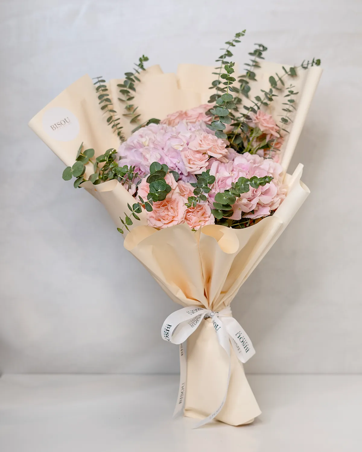 colorful spray roses and hydrangea bouquet